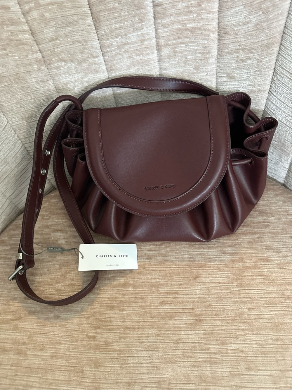 Charles & Keith Blossom Curved Flap Crossbody Bag Dark Chocolate Mini Purse